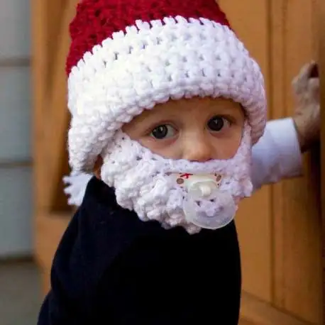 Bonnet rouge et blanc avec barbe de père Noël pour enfant