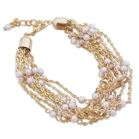 Bracelet aux 9 chainettes dorées parées de perles blanches